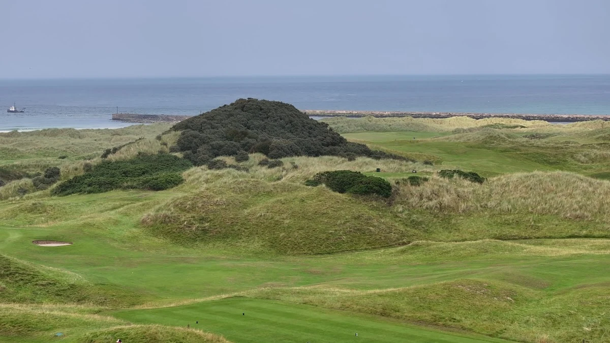 Castlerock Golf Club — a green among the dunes with the Atlantic beyond on the Mussenden Links Castlerock Golf Club — a green among the dunes with the Atlantic beyond on the Mussenden Links