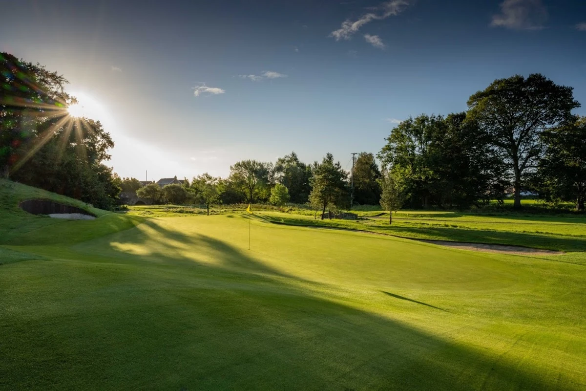 Galgorm Castle Golf Club — a parkland green and bunkers on the championship course Galgorm Castle Golf Club — a parkland green and bunkers on the championship course
