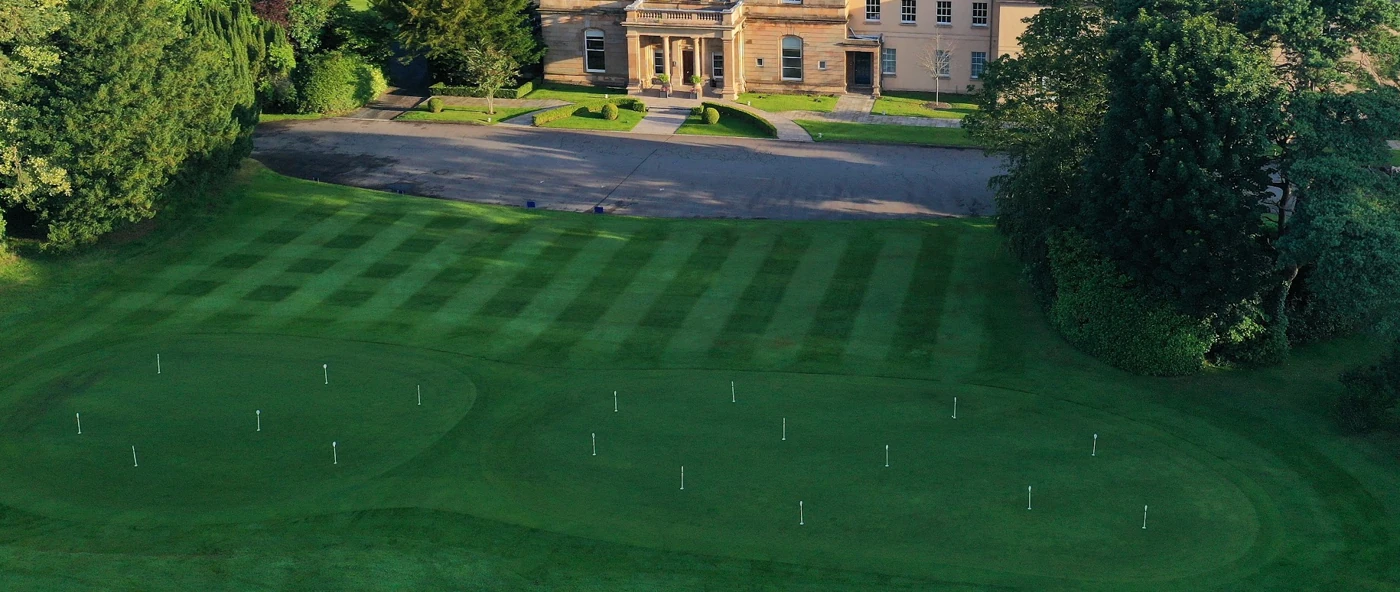 Royal Belfast Golf Club — a putting green below the historic clubhouse