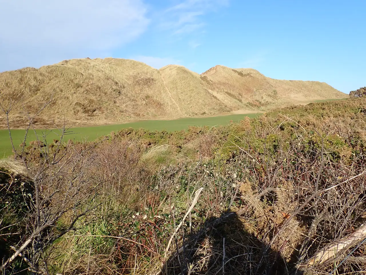Royal County Down Golf Club — greens set between the sand dunes on the Championship Course Royal County Down Golf Club — greens set between the sand dunes on the Championship Course